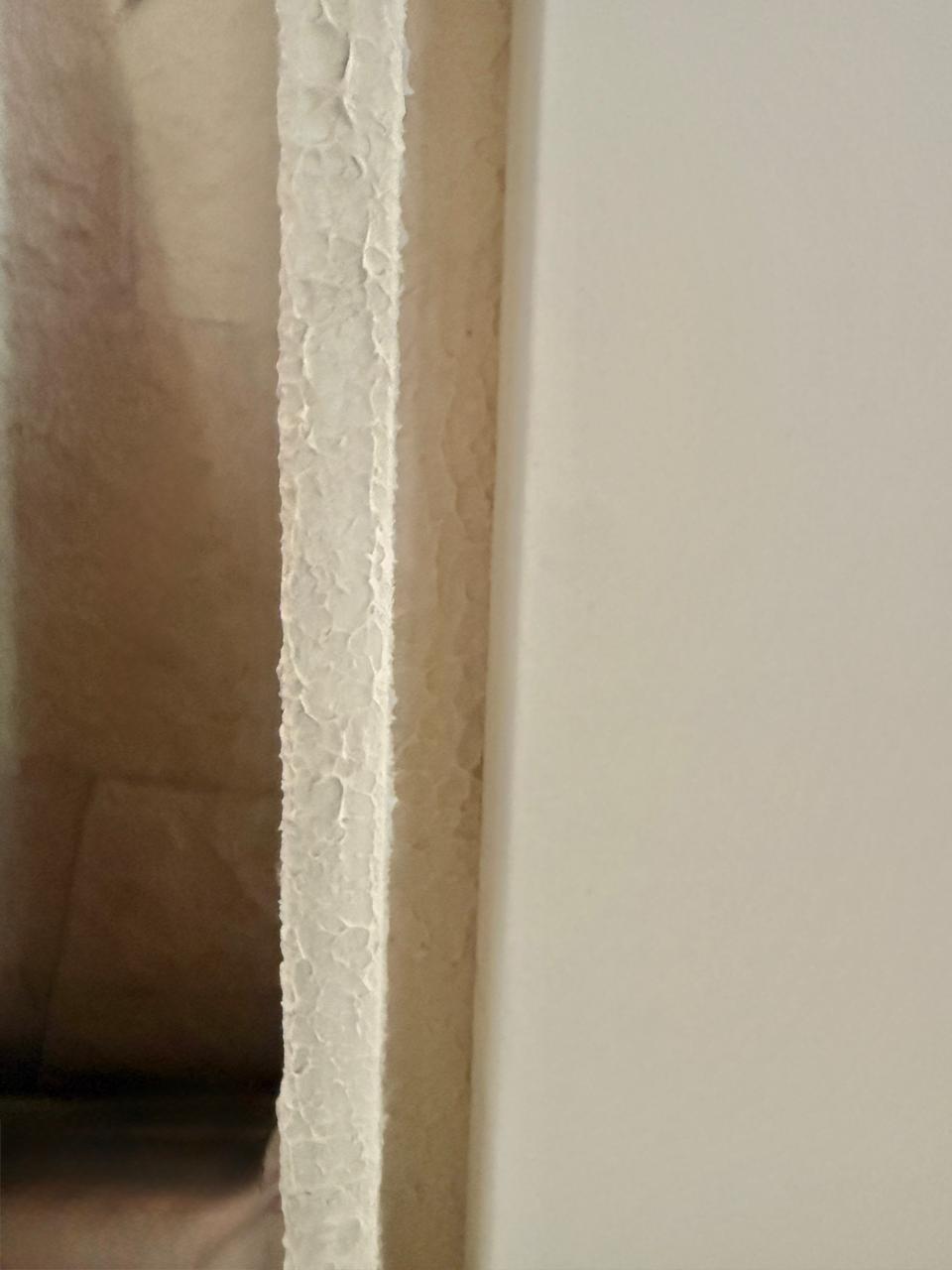 Escultura de pared sobre lienzo, marco con textura mineralizada
